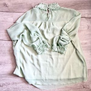Mint green & classy top.